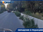 Новая дорога заросла травой после ремонта в центре Волжского: видео