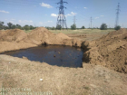 В Волжском нашли химические отходы в ямах на месте бывшей АЗС