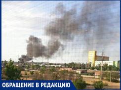 Черные клубы дыма заволокли половину неба