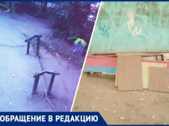 Неизвестный громит детскую площадку и срезает лавки во дворе дома в Волжском