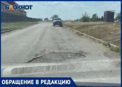 Большегрузы «раздолбали» дорогу в самом центре Волжского: видео