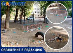 В первый класс с видом на мусор в одном из дворов Волжского