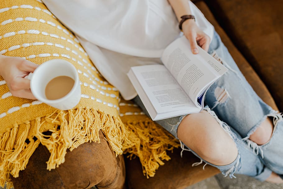 coffee-cup-woman-cafe-reads-book.jpg